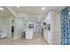 Updated kitchen with stainless steel appliances, a kitchen island and a seamless flow to other areas at 8140 Karriker Rd, Kannapolis, NC 28081