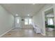 Bright and airy living room with neutral paint and modern flooring at 8140 Karriker Rd, Kannapolis, NC 28081