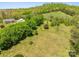 Aerial view showcasing the home, surrounding greenery, and the natural beauty of the landscape at 1046 Linneys Mill Rd, Union Grove, NC 28689