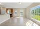 Bright kitchen area with natural light, a breakfast bar, and backyard views at 1046 Linneys Mill Rd, Union Grove, NC 28689