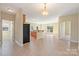 Expansive living area featuring an open floor plan, with a view from the hallway at 1046 Linneys Mill Rd, Union Grove, NC 28689