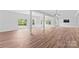 Spacious basement with LVP flooring, neutral paint, and natural light at 110 Preserve Way, Mooresville, NC 28117