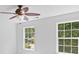 Bright bedroom features natural light and a ceiling fan at 110 Preserve Way, Mooresville, NC 28117