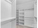 Walk-in closet with ample shelving and hanging space for organization at 110 Preserve Way, Mooresville, NC 28117