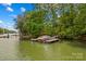 Enjoy premier lakeside living with direct access via a private boat dock and lift at 110 Preserve Way, Mooresville, NC 28117