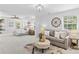 Spacious main bedroom with sitting area, tray ceiling and natural light at 110 Preserve Way, Mooresville, NC 28117