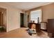 Bedroom featuring a vintage desk with bright natural light from the window at 114 S 5Th St, Albemarle, NC 28001