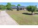 Beautiful single-story brick home with a well-manicured lawn and long driveway, perfect for suburban living at 118 Sir Gregory Dr, Shelby, NC 28152