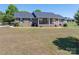 Charming brick home with a welcoming front porch and lush landscaping creates great curb appeal at 118 Sir Gregory Dr, Shelby, NC 28152