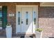Elegant front entrance with decorative glass door and stylish planters at 118 Sir Gregory Dr, Shelby, NC 28152