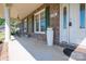 Inviting covered front porch with white columns and decorative accents at 118 Sir Gregory Dr, Shelby, NC 28152