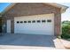 Attached two-car garage with panel windows and side entry door at 118 Sir Gregory Dr, Shelby, NC 28152