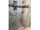 This bathroom features a glass shower, with tile surround, and built-in storage at 118 Sir Gregory Dr, Shelby, NC 28152