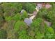 Aerial view of the neighborhood, surrounded by dense trees offering a serene view of the area at 121 Northampton Dr, Mooresville, NC 28117