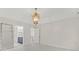 Bright bedroom with access to a bathroom and view of an upstairs landing at 121 Northampton Dr, Mooresville, NC 28117