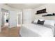 Bedroom with gray accents, large window and entryways to closet and other rooms at 1210 Langdon Terrace Dr, Indian Trail, NC 28079