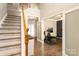 Staircase leading to workout room with workout bike and treadmill at 1210 Langdon Terrace Dr, Indian Trail, NC 28079