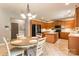 Eat-in kitchen with light-colored countertops, center island, and stainless steel appliances at 1210 Langdon Terrace Dr, Indian Trail, NC 28079