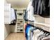 Organized walk-in closet featuring clothing racks, shelves, and carpeted floors at 1210 Langdon Terrace Dr, Indian Trail, NC 28079