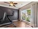 Inviting workout room with dark accent wall and large window at 1210 Langdon Terrace Dr, Indian Trail, NC 28079