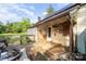 Exterior view of house featuring siding, metal roof, and weathered wood deck at 1221 Patterson St, Shelby, NC 28152