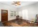 Bright living room with hardwood floors and natural light entering from an exterior window at 1221 Patterson St, Shelby, NC 28152