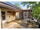 Rustic porch with exposed wood and a screened-in outdoor living space at 1221 Patterson St, Shelby, NC 28152