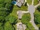 Aerial view of this beautiful home, driveway and lush landscaping at 16565 Kimbolten Dr, Huntersville, NC 28078