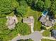 Aerial view of property showcasing home, driveway and beautiful backyard at 16565 Kimbolten Dr, Huntersville, NC 28078