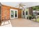 Enjoy the screened porch with brick wall and an airy feel at 16565 Kimbolten Dr, Huntersville, NC 28078
