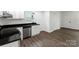 This bright kitchen features white cabinets, granite counters, and stainless-steel appliances at 1750 Oak Valley Dr, Gastonia, NC 28054