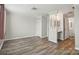 This bedroom features laminate flooring and light fixtures that adds a touch of elegance at 202 Water Oak Dr, Pineville, NC 28134
