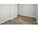 Bedroom features wood-look floors and neutral paint at 202 Water Oak Dr, Pineville, NC 28134