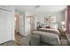 Bright main bedroom with ensuite access, closet and neutral colors at 202 Water Oak Dr, Pineville, NC 28134