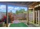 Cozy patio with stone pavers, flowers, plants, and a wood fence offering a relaxing outdoor space at 202 Water Oak Dr, Pineville, NC 28134