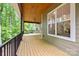 Expansive back porch with wood ceiling and fan provides a relaxing outdoor space at 2108 Lakeview Cir, Matthews, NC 28105