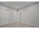 Neutral bedroom features a closet and white trim at 2108 Lakeview Cir, Matthews, NC 28105