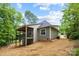 Charming home featuring an open porch, nestled amongst mature trees, offers a serene outdoor retreat at 2108 Lakeview Cir, Matthews, NC 28105