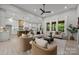 Bright and open living space with kitchen, dining, and living area, perfect for entertaining at 2108 Lakeview Cir, Matthews, NC 28105