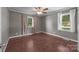 Cozy bedroom featuring hardwood floors and ample natural light at 250 Log Barn Rd, Salisbury, NC 28146