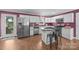 Well-equipped kitchen with stainless steel appliances, granite countertops, and a breakfast bar at 250 Log Barn Rd, Salisbury, NC 28146