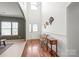 Bright foyer with hardwood floors, a high ceiling, and a charming decorative table at 306 Fesperman Cir, Troutman, NC 28166