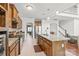 Spacious kitchen featuring granite counters, stainless appliances, large island and ample cabinetry at 306 Fesperman Cir, Troutman, NC 28166