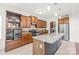 Gourmet kitchen featuring an island, granite countertops, stainless steel appliances, and custom cabinetry at 306 Fesperman Cir, Troutman, NC 28166