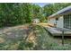 Backyard view from deck featuring home, yard, and storage building at 3442 Cedar Circle Rd, Lancaster, SC 29720