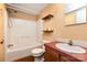Bathroom with bathtub and shower, wooden floors, and a sink with a coral countertop at 3442 Cedar Circle Rd, Lancaster, SC 29720