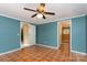 Bedroom featuring a ceiling fan, and neutral-toned walls and wood-patterned floors at 3442 Cedar Circle Rd, Lancaster, SC 29720