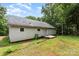 View of home exterior, featuring a siding and a small wood deck with access via sliding glass door at 3442 Cedar Circle Rd, Lancaster, SC 29720
