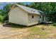 View of the back exterior of the house with a small deck at 3442 Cedar Circle Rd, Lancaster, SC 29720