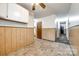 Cozy dining area with retro vinyl floors and wood paneling at 3491 Mcconnells Hwy, Rock Hill, SC 29732